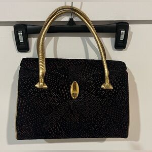 Vintage mini suede texture gold handbag.